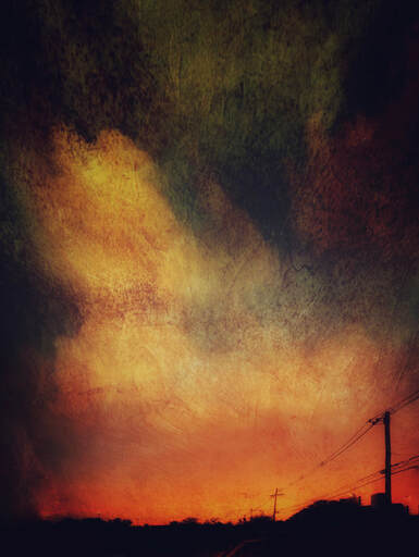 Photograph of a colourful sunrise. Title: Dystopian Sunrise by Michael Anthony